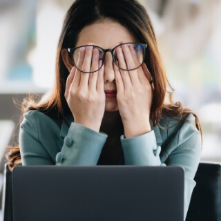 Female patient suffering from anxiety in a therapy session with The Good Life