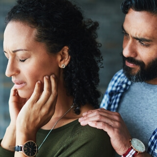 Couple experiencing relationship difficulties with The Good Life's guidance
